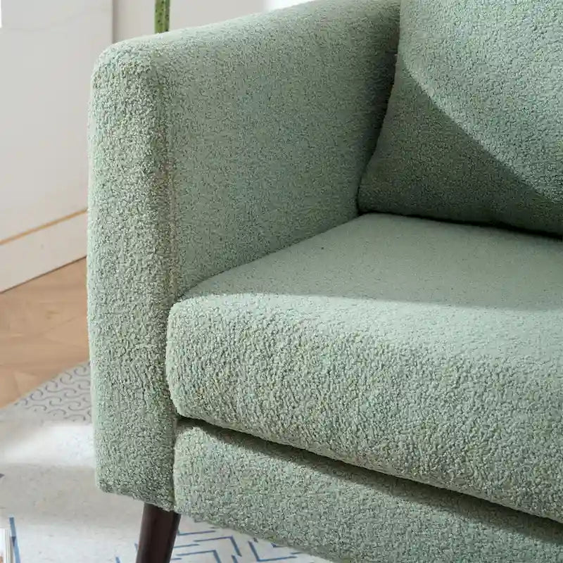 Fauteuil rembourré vert 26.77 avec pieds en bois massif