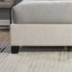 Lit plateforme rembourré en polyester beige avec tête de lit capitonnée à oreilles