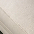 Canapé Cury Glam en tissu beige, capitonné avec garniture cloutée